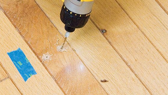 why do hardwood floors squeak